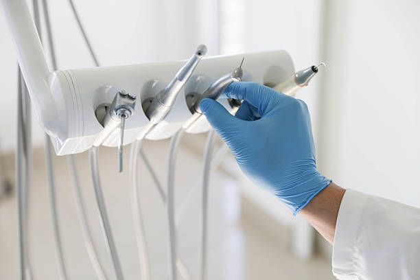 Professional Tooth Extraction technician working in Harvey County County, KS